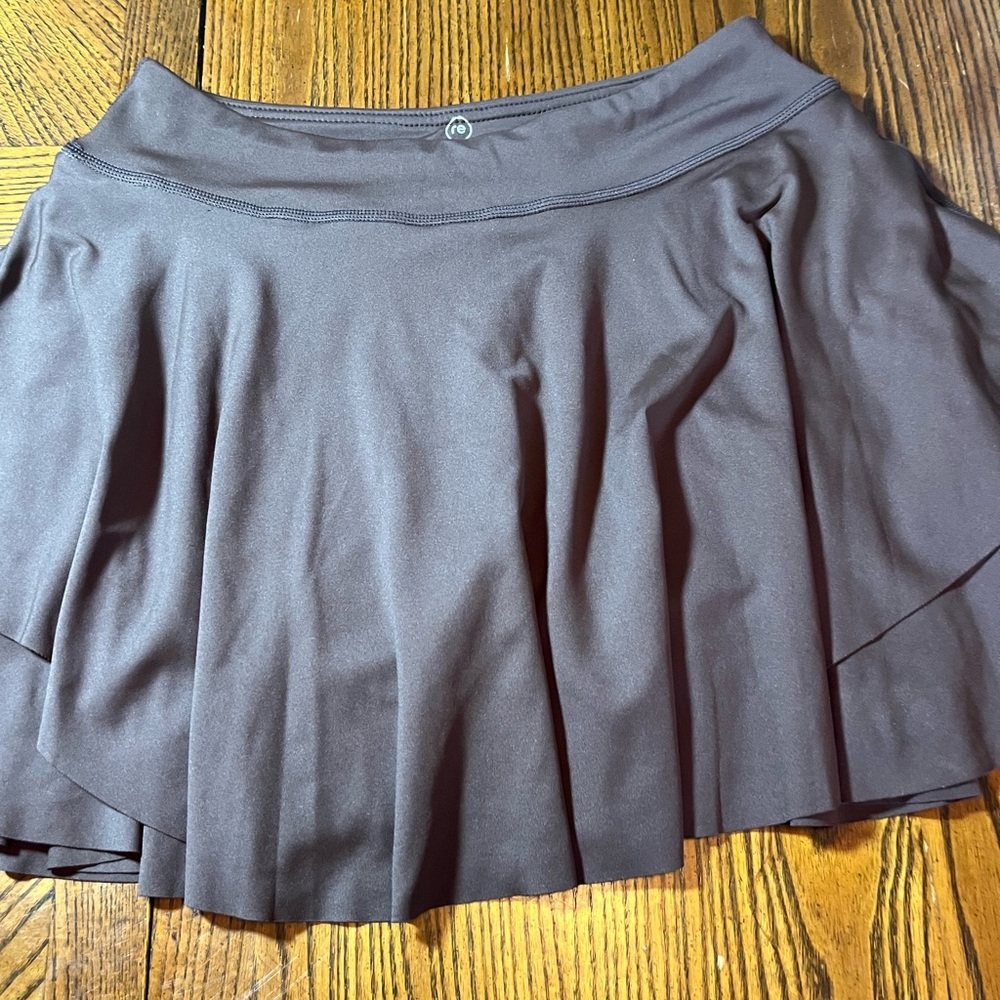 REAL ESSENTIALS BROWN TENNIS SKORT. NWOT. SIZE SMALL
